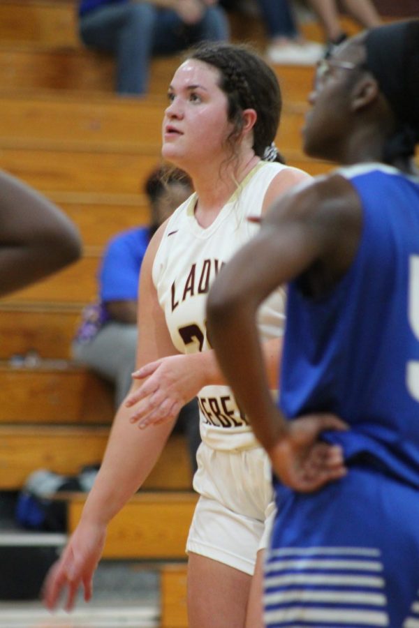 Lady Rebel Basketball player gets ready to play.