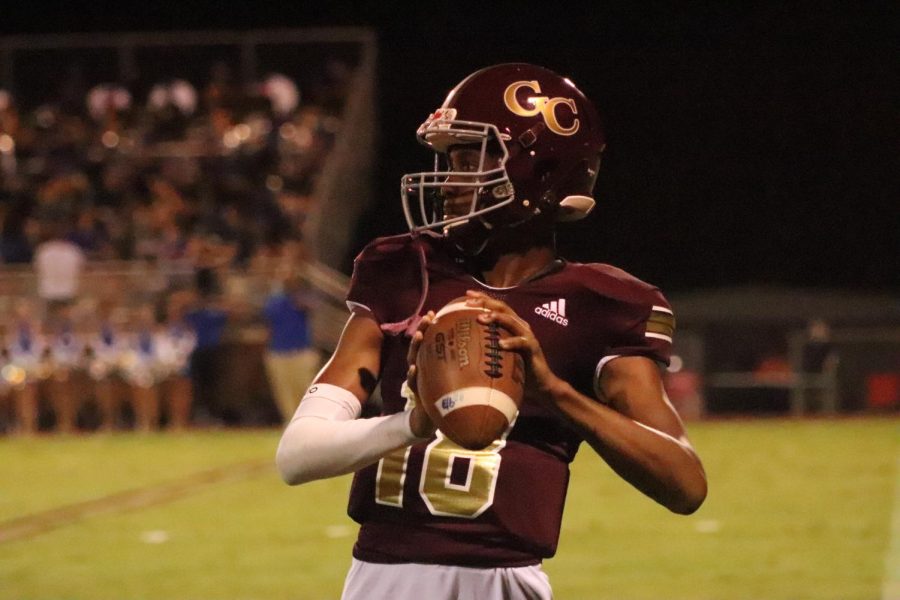 Deuce Knight prepares to throw the ball to teammate.