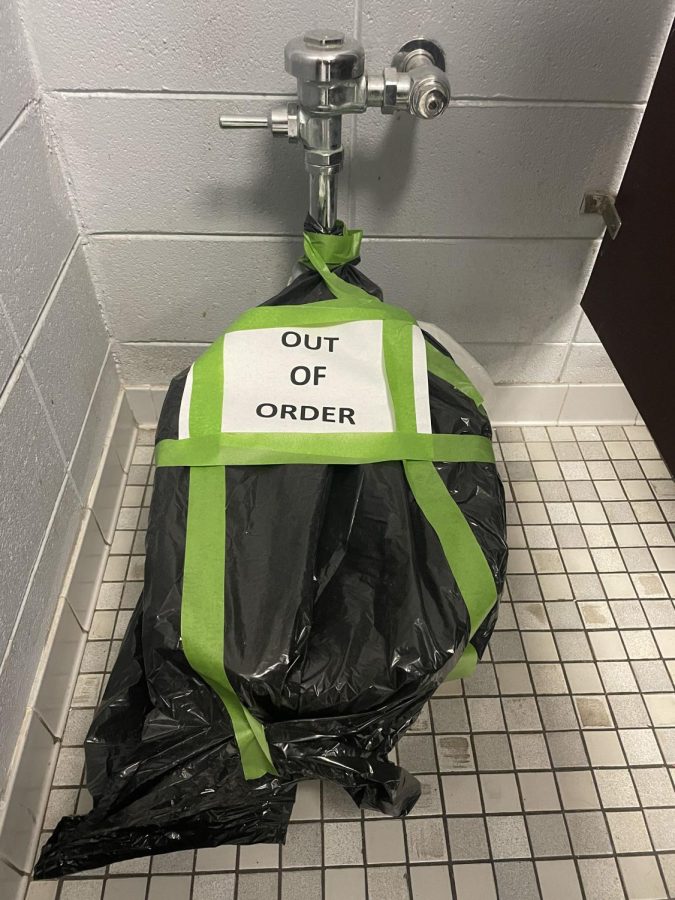 Broken+restroom+toilet+is+out+of+service.+
