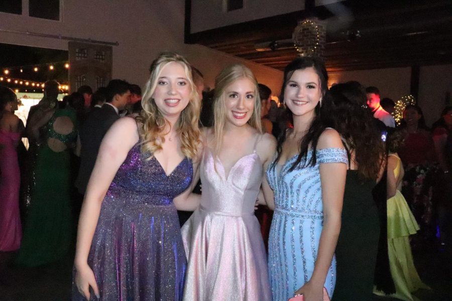 Layla Jamison, Julianne Davis, and Mackenize Yawn enjoy 2021 prom.  